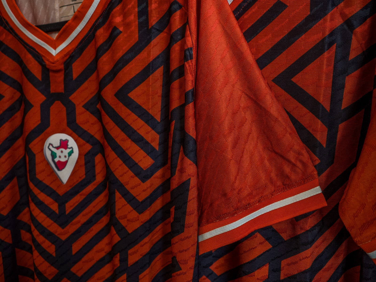 Omm red jersey