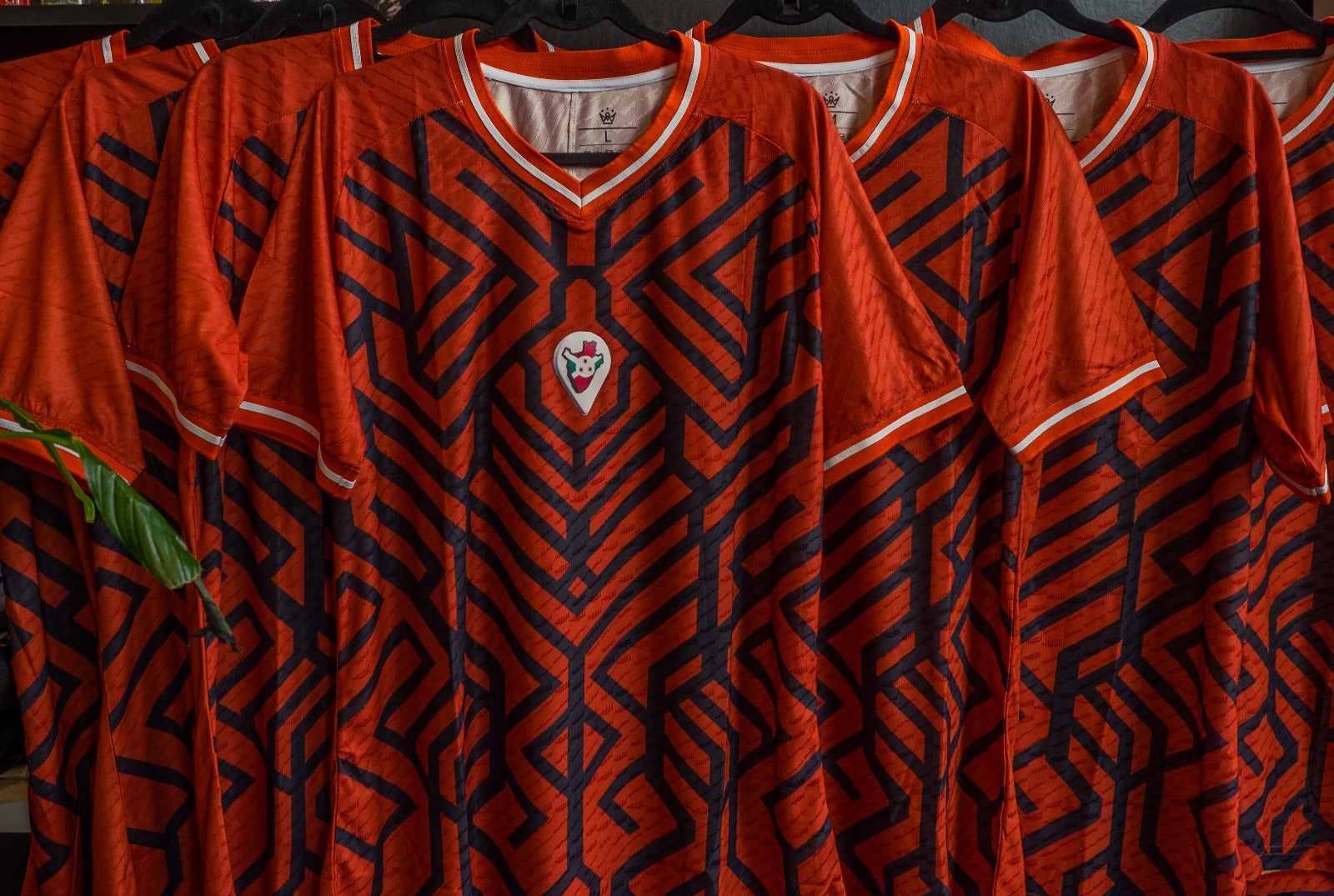 Omm red jersey
