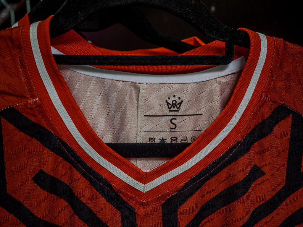 Omm red jersey