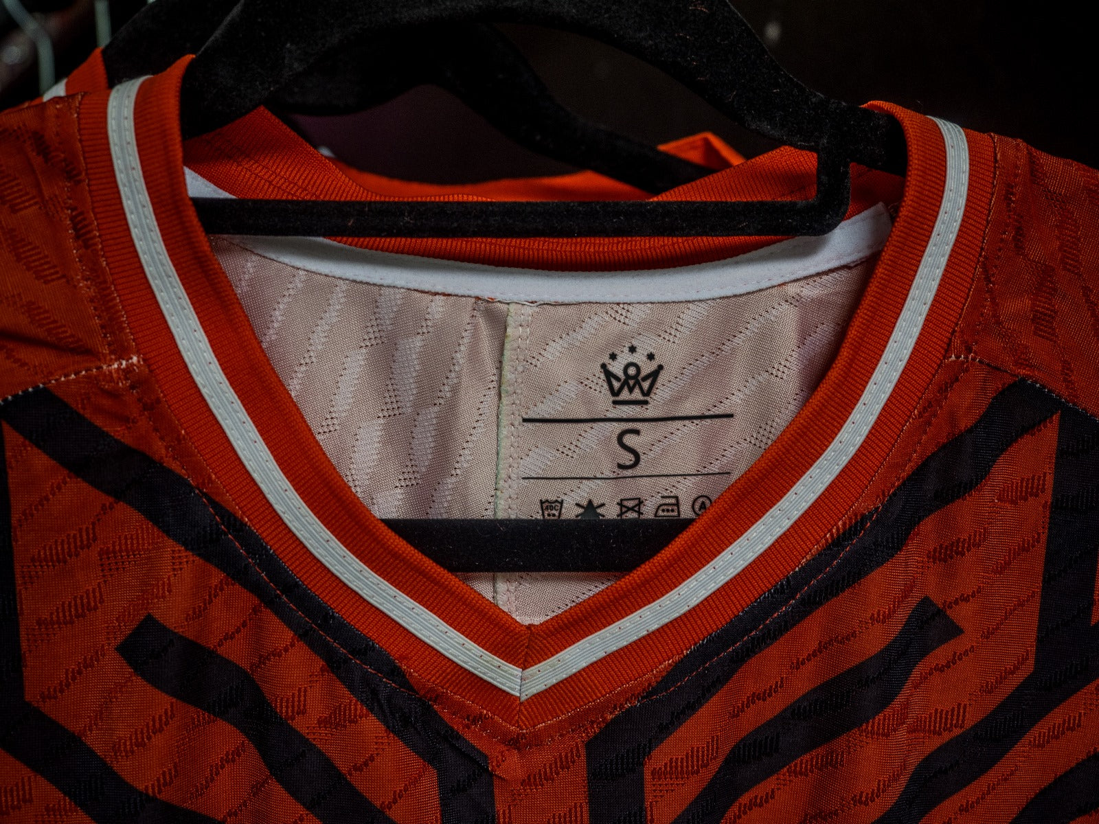 Omm red jersey