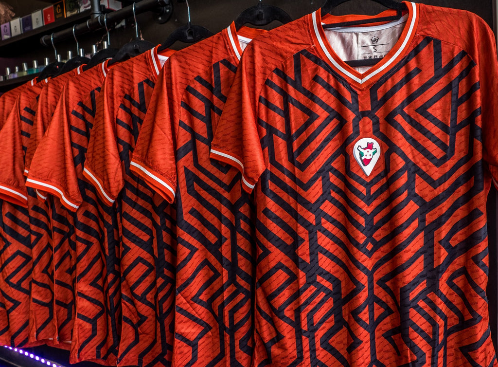 Omm red jersey
