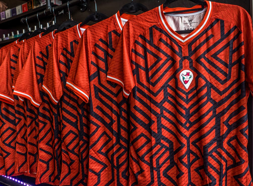 Omm red jersey