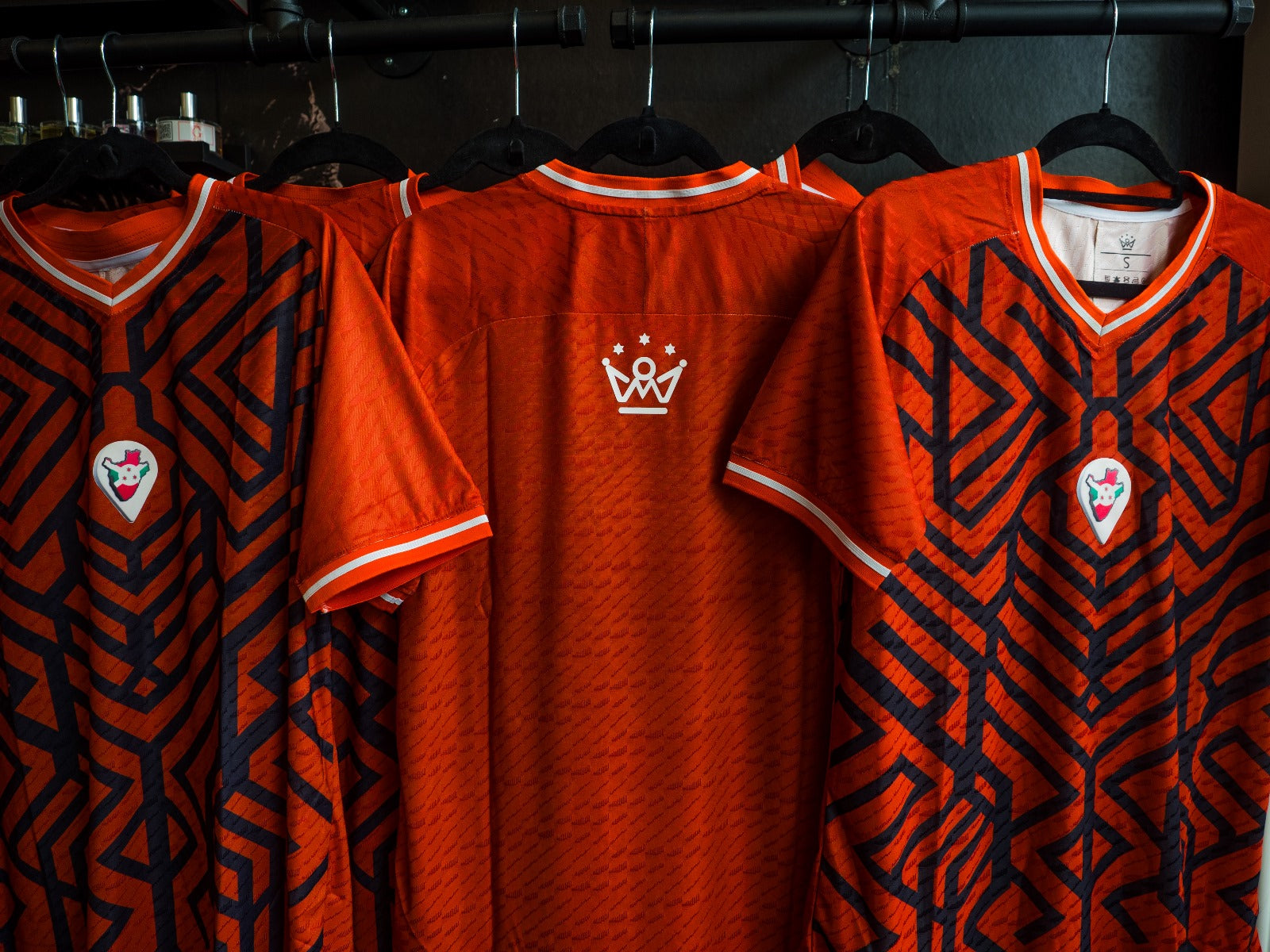 Omm red jersey